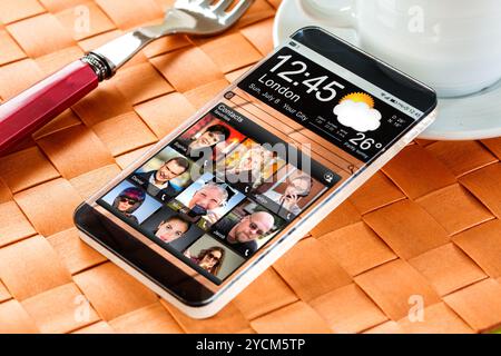 Smartphone with a transparent display. Stock Photo