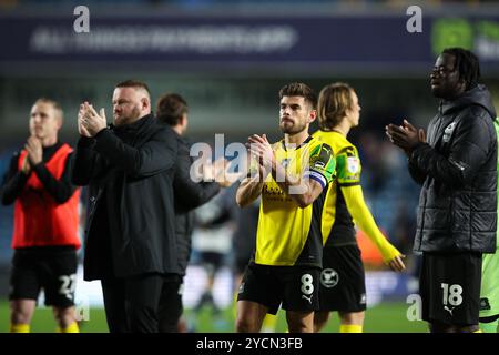 LONDON, UK - 23rd Oct 2024:  Joe Edwards of Plymouth Argyle applauds the fans after the EFL Championship match between Millwall FC and Plymouth Argyle FC at The Den  (Credit: Craig Mercer/ Alamy Live News) Stock Photo