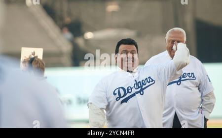 Los Angeles, California, USA. 31st Mar, 2011. Former Pitcher Fernando Valenzuela throws the first pitch prior to the Los Angeles Dodgers playing the San Francisco Giants on Opening Day at Dodger Stadium on March 31, 2011 in Los Angeles, California.Armando Arorizo/ (Credit Image: © Armando Arorizo/Pi/Prensa Internacional via ZUMA Press Wire) EDITORIAL USAGE ONLY! Not for Commercial USAGE! Stock Photo