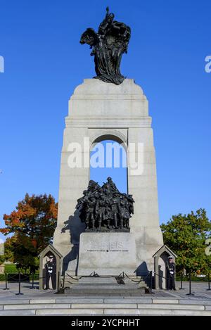 Ottawa, Canada - October 21, 2024: Sentries stand guard at the National War Memorial, a memorial arch with bronze sculptures built to commemorate Cana Stock Photo