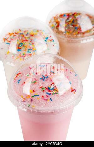 different milkshake cocktails with bubbles and multicolor bakery sweet edible confetti. Stock Photo