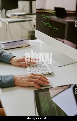 Hands Of Unrecognizable Female Programmer Stock Photo