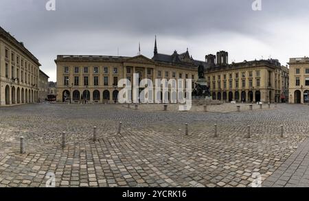 Reims, France- 13 September, 2022: panorama view of the Place Royal Square in downtown Reims with the statue of Louis XV in Roman garb Stock Photo