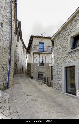 San Marino, San Marino, 14 October, 2021: narrow street with massive stone buildings in the historic city center of the capital of San Marino, Europe Stock Photo