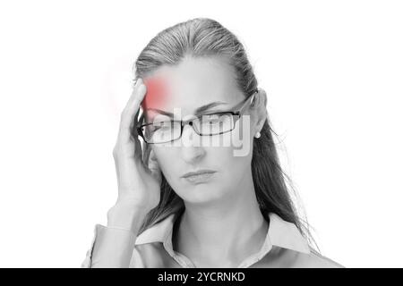 Mature business woman holding head in hands Stock Photo