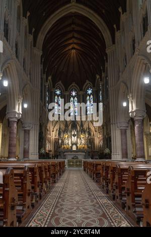 Cobh, Ireland, 15 August, 2022: vertical view of the central nave and altar inside the Cobh Cathedral, Europe Stock Photo