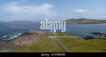 A landscape view of Gubbacashel Point at the entrance of Broadhaven Bay with the historic Ballyglass Lighthouse Stock Photo