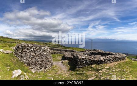 Fahan, Ireland, 5 August, 2022: view of the Fahan beehive huts on the Dingle Peninsula in County Kerry of western Ireland, Europe Stock Photo