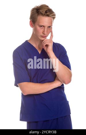 Sad Young Man in a Surgical Mask by the Window in the Room Stock Photo ...
