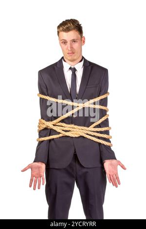 Businessman tied up in rope. Stock Photo