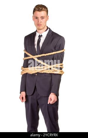 Businessman tied up in rope. Stock Photo