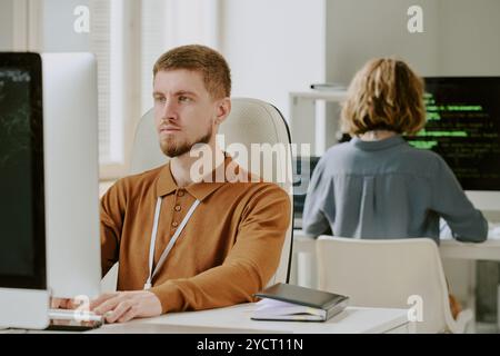 Bearded Man Working On Computer Stock Photo