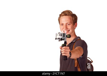 Videographer holds mobile camera on gimbal. Stock Photo