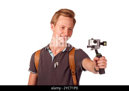 Videographer holds mobile camera on gimbal. Stock Photo