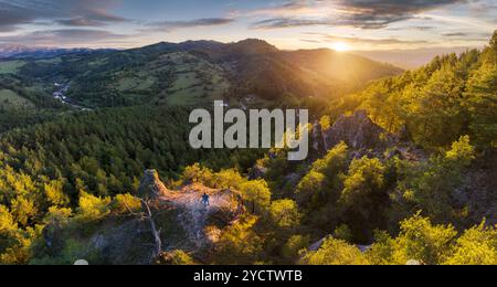 Scenic landscape in Hricov, Slovakia, on beautiful autumn sunrise with colorful leaves on trees in forest Stock Photo
