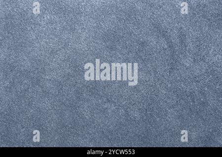 Close-up of soft blue velour fabric texture, perfect for design or upholstery use. Stock Photo