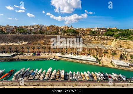 Valletta aerial panoramic cityscape of the Valletta Waterfront with cruise ship port, historical landmarks, restaurants and shops. Malta skyline, day. Stock Photo