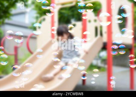 Girls playing in park Stock Photo