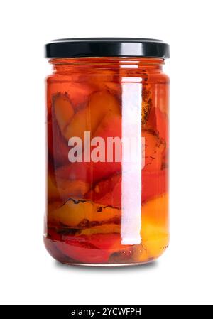 Grilled red and yellow bell peppers, preserved in sunflower oil and vinegar, in a glass jar with screw cap. Cut sweet peppers, roasted, and salted. Stock Photo