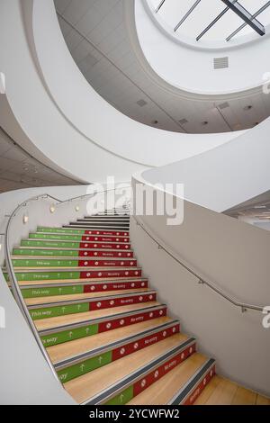 England, Lancashire, Liverpool, Pier Head, The Museum of Liverpool opened in 2011 and tells the story of Liverpool and its people while reflecting on the city's global significance, the buildings sweeping spiral staircase. Stock Photo