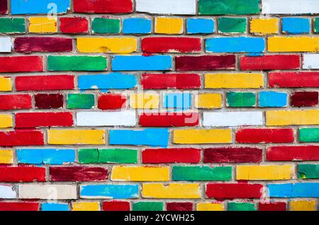 Colorful brick wall from multi colored bricks as a creative background texture Stock Photo