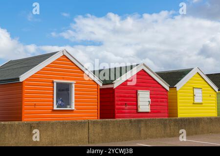 3 three colourful beach huts at Southwold, Suffolk, UK in April Stock Photo