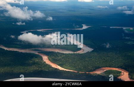 Amazon Jungle River, estuary, aerial view from plane. Amazon rainforest Peru, dense jungle, Stock Photo