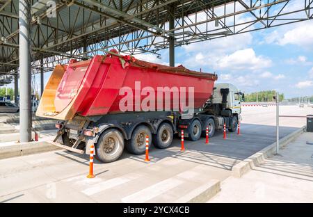 Cars passing through the automatic point of payment on a toll road Stock Photo