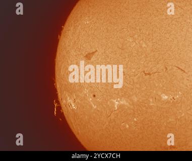 London, UK. 24th Oct, 2024. Large and complex sunspot group 3869 complete with looping prominences come into view from the solar limb, a possible future source of aurora in the near future. Credit: Malcolm Park/Alamy Live News Stock Photo