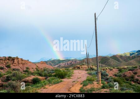 Rainbow over Skazka canyon, kyrgyzstan Stock Photo