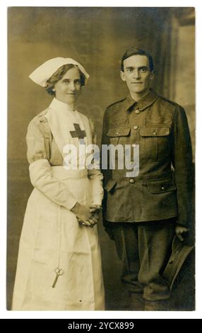 Original WW1 era postcard of a couple serving their country during the Great War - a soldier and a red cross nurse, perhaps husband and wife, fiance fiances, brother and sister ? Postcard from the studio of W H Bayliss, 49 Wilbraham Rd. Chorlton, near Manchester, Cheshire, U.K. Stock Photo