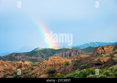 Rainbow over Skazka canyon, kyrgyzstan Stock Photo