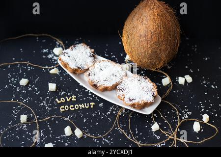 Coconut muffins on a black background Stock Photo
