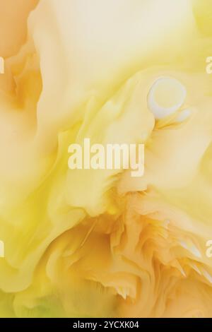 This illustration captures abstract, swirling bursts of colors, predominantly in soft yellow tones that create a dreamy and fluid visual effect Stock Photo