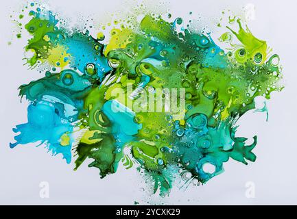 A vibrant, expressive artwork of abstract ink drops, featuring vivid green and blue hues merged with dynamic bubbles and splashes Stock Photo