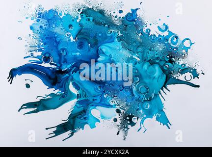 A captivating abstract composition featuring dynamic blue ink splashes and drops dispersed across a clean, white background, creating a visually strik Stock Photo