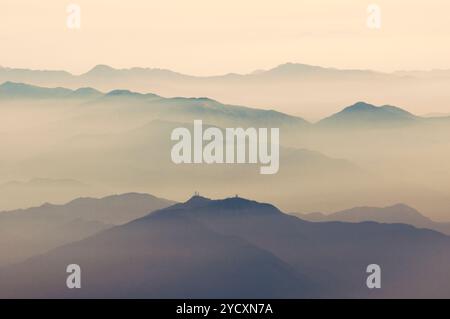 scenic foggy atmosphere above Japanese mountains by early morning Stock Photo