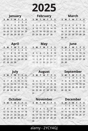 2025 english annual calendar on crumpled rough paper page Stock Photo