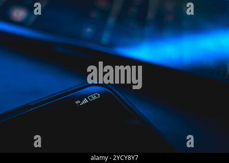 5G wireless internet indicator on cellphone screen. High quality photo Stock Photo