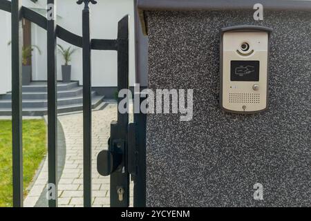 Metal Gate with Card Access Intercom and Key Lock Stock Photo