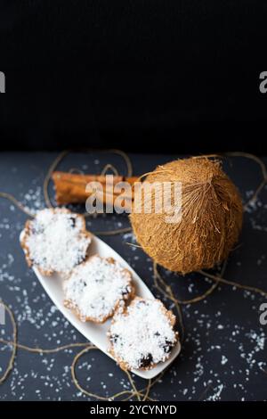 Coconut muffins on a black background Stock Photo