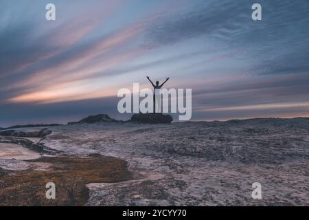 Female arms outstretched to the sky at Lincolns Rock Blue Mountains Stock Photo