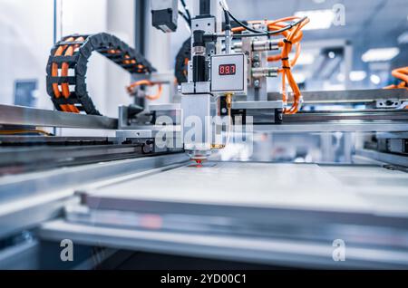 CNC Laser cutting of metal, modern industrial technology. Stock Photo