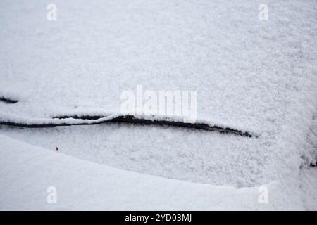 Cars covered in fresh snow Stock Photo