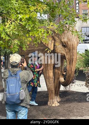 The great elephant migration public art display features elephants made from invasive weeds to highlight conservation projects, 2024, NYC, USA Stock Photo