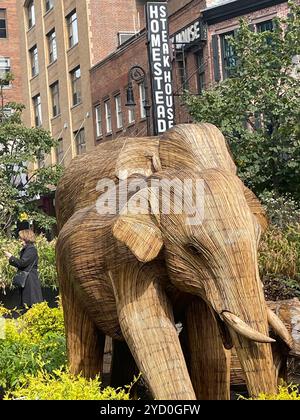 The great elephant migration public art display features elephants made from invasive weeds to highlight conservation projects, 2024, NYC, USA Stock Photo