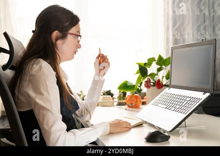 Woman Working And Programming On Computer In Office.woman working on coding on laptop Stock Photo