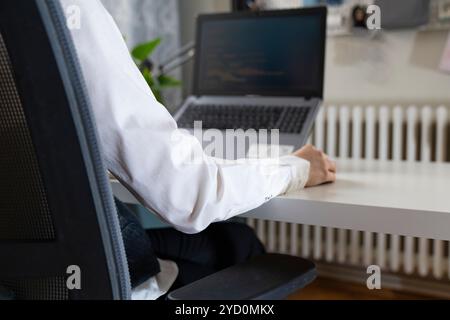 Woman Working And Programming On Computer In Office.woman working on coding on laptop Stock Photo
