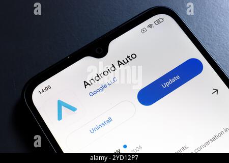 October 24, 2024, Portugal. In this photo illustration, the Android Auto app logo is displayed on a smartphone screen Stock Photo