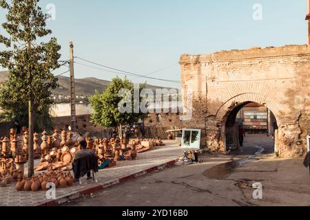 Countryside, Morocco, July 23th 2019: Exploring the vibrant marketplace near the historic archway in Morocco’s charming cityscape Stock Photo